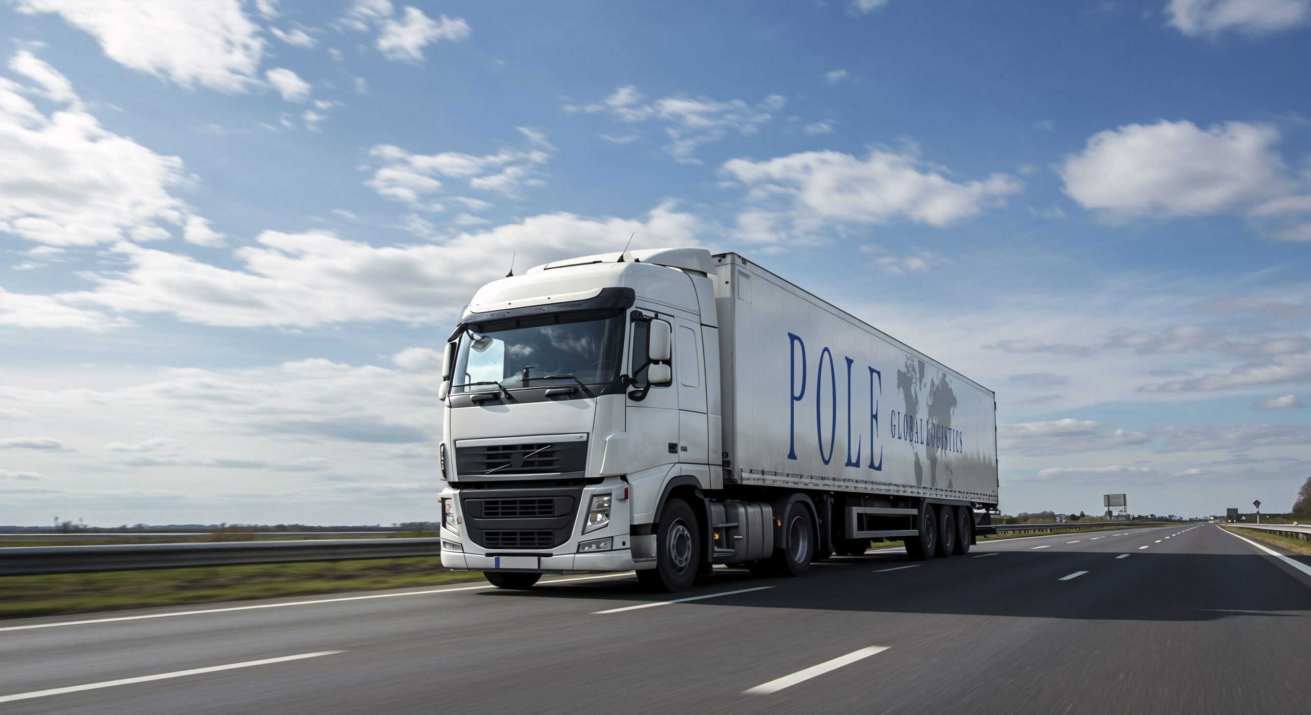 white-semi-truck-driving-highway-blue-sky2